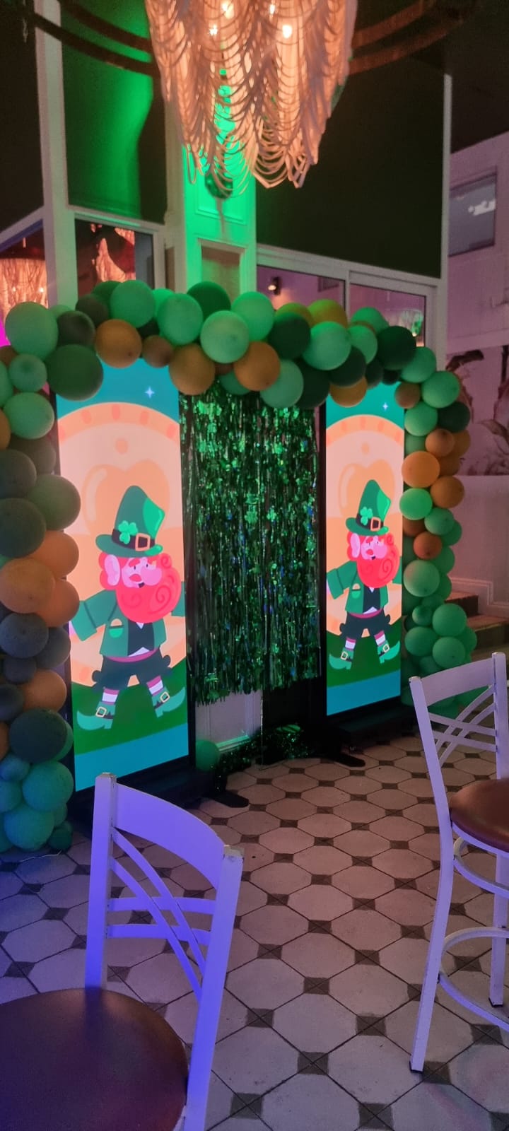 Two LED Posters used in a green themed celebration entrance